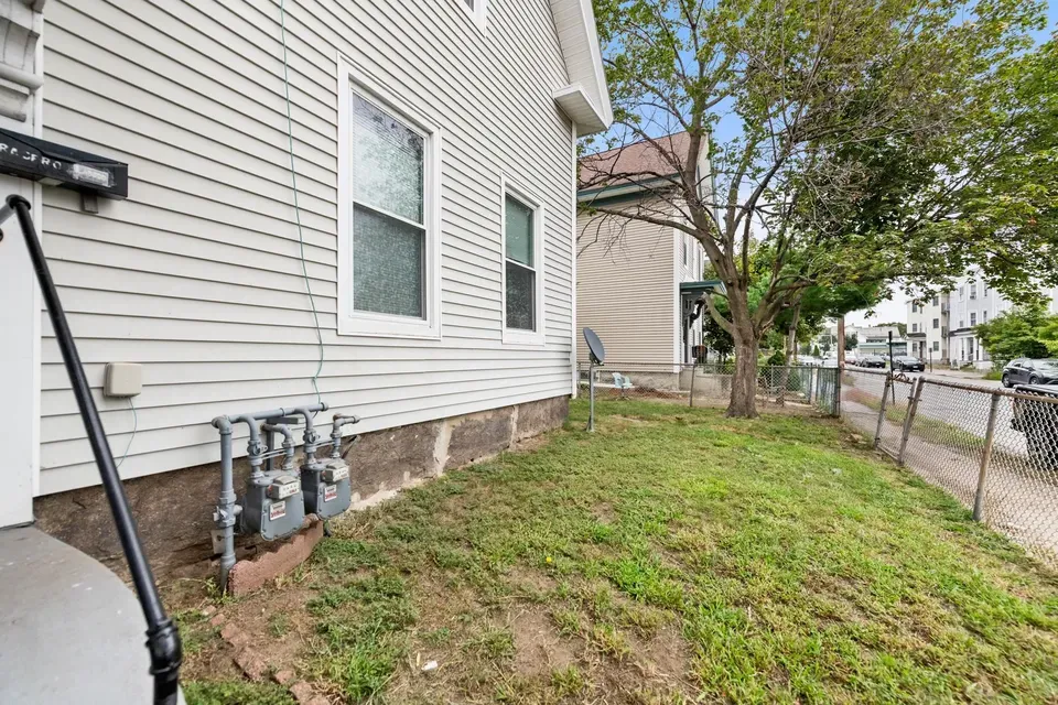 4 Bed 2 Bath Multi-Unit Residential Property in Manchester, NH - 4