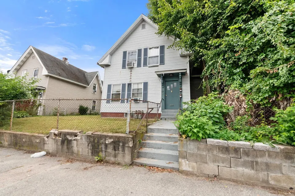 6 Bed 2 Bath Multi-Unit Residential Property in Manchester, NH - 1