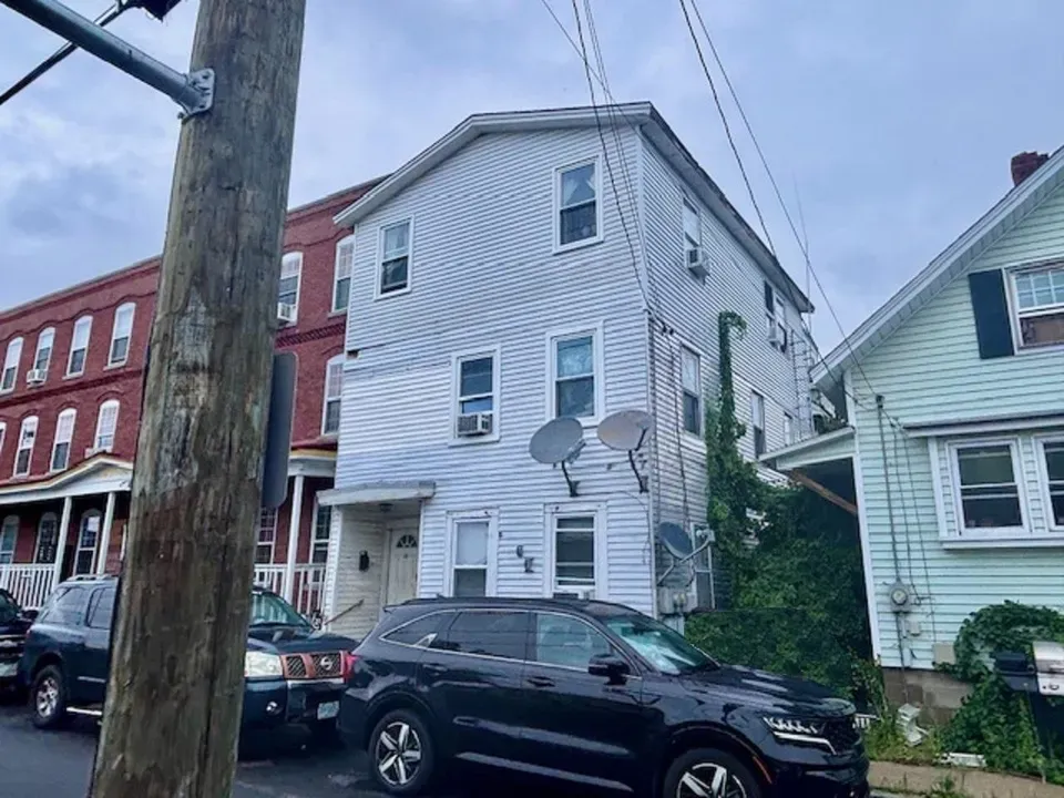 7 Bed 2 Bath Multi-Unit Residential Property in Nashua, NH